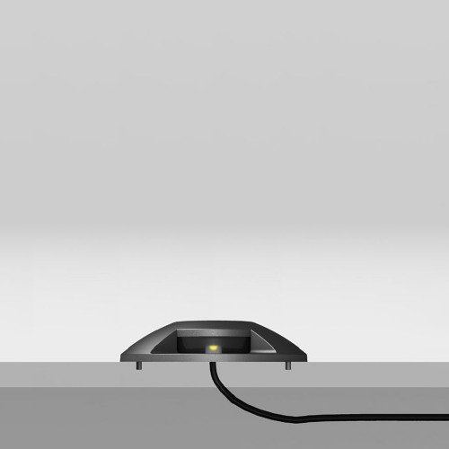 Zwarte led vloerspot verspreidt strijklicht aan 2 zijden, de Evo deckspot 2 lichts, een ronde opbouw grondspot, geen onderbouw, vlakke onderzijde